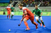 7 August 2016; Mink van der Weerden of Netherlands in action against Alan Sothern of Ireland during their Pool B match at the Olympic Hockey Centre, Deodoro, during the 2016 Rio Summer Olympic Games in Rio de Janeiro, Brazil. Photo by Brendan Moran/Sportsfile