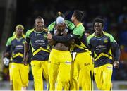 7 August 2016;  Andre Russell (C) of Jamaica Tallawahs covers his face in celebration of Nic Maddinson of Guyana Amazon Warriors dismissal during Match 34 of the Hero Caribbean Premier League (CPL) – Final at Warner Park in Basseterre, St Kitts. Photo by Randy Brooks/Sportsfile