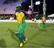 7 August 2016;  Dwayne Smith (L) and Nic Maddinson (R) of Guyana Amazon Warriors run onto the field at the start of Match 34 of the Hero Caribbean Premier League (CPL) – Final at Warner Park in Basseterre, St Kitts. Photo by Randy Brooks/Sportsfile