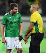 7 August 2016; Kyle Good of Ireland speaks to umpire Nathan Stagno after their Pool B match against the Netherlands at the Olympic Hockey Centre, Deodoro, during the 2016 Rio Summer Olympic Games in Rio de Janeiro, Brazil. Photo by Brendan Moran/Sportsfile