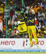 7 August 2016;  Kesrick Williams (L) and Jonathan Foo (R) of Jamaica Tallawahs jump in celebration of Steven Jacobs of Guyana Amazon Warriors dismissal during Match 34 of the Hero Caribbean Premier League (CPL) – Final at Warner Park in Basseterre, St Kitts. Photo by Randy Brooks/Sportsfile