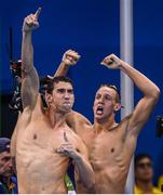 7 August 2016; Michael Phelps, left, and Caeleb Dressel of USA celebrate winning the final of the Men's 4 x 100m Freestyle Relay at the Olympic Aquatic Stadium during the 2016 Rio Summer Olympic Games in Rio de Janeiro, Brazil.