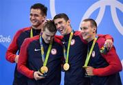 7 August 2016; Team USA, from left, Nathan Adrian, Ryan Held, Michael Phelps and Caeleb Dressel with their gold medals after they won the Men's 4 x 100m Freestyle Relay at the Olympic Aquatic Stadium during the 2016 Rio Summer Olympic Games in Rio de Janeiro, Brazil. Photo by Stephen McCarthy/Sportsfile