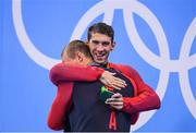 7 August 2016; Team USA's Michael Phelps and Caeleb Dressel after their team won the Men's 4 x 100m Freestyle Relay at the Olympic Aquatic Stadium during the 2016 Rio Summer Olympic Games in Rio de Janeiro, Brazil. Photo by Stephen McCarthy/Sportsfile