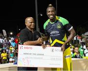 7 August 2016;   Andre Russell (R) of Jamaica Tallawahs receives HERO of the League from the Honourable Lindsay Grant (L) Minister of Tourism at the end of Match 34 of the Hero Caribbean Premier League (CPL) – Final at Warner Park in Basseterre, St Kitts. Photo by Randy Brooks/Sportsfile