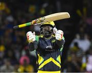 7 August 2016;  Chris Gayle of Jamaica Tallawahs celebrates his half century during Match 34 of the Hero Caribbean Premier League (CPL) – Final at Warner Park in Basseterre, St Kitts. Photo by Randy Brooks/Sportsfile
