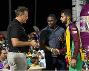 7 August 2016; Tournament Runner Up medals for Ali Khan, right, of Guyana Amazon Warriors from CPL Chief Operations Officer, Pete Russell, left, and President of the West Indies Player Association, Wavell Hinds, centre, at the end of Match 34 of the Hero Caribbean Premier League (CPL) – Final at Warner Park in Basseterre, St Kitts. Photo by Randy Brooks/Sportsfile