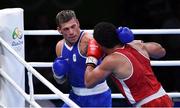 8 August 2016; Clemente Russo of Italy, left, and Hassen Chaktami of Tunisia during their Heavyweight preliminary round of 32 bout in the Riocentro Pavillion 6 Arena during the 2016 Rio Summer Olympic Games in Rio de Janeiro, Brazil. Photo by Stephen McCarthy/Sportsfile