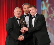 15 October 2010; Richie Power, Kilkenny, is presented with his GAA Hurling All-Star award by Uachtarán Chumann Lúthchleas Gael Criostóir Ó Cuana and Jeroen Hoencamp, CEO, Vodafone Ireland, during the 2010 GAA All-Stars Awards, sponsored by Vodafone. Citywest Hotel & Conference Centre, Saggart, Co. Dublin. Picture credit: Brendan Moran / SPORTSFILE