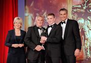 15 October 2010; Brendan Maher, Tipperary, is presented with his GAA Hurling All-Star Young Player of the Year award by Uachtarán Chumann Lúthchleas Gael Criostóir Ó Cuana, Mary Hanafin TD, Minister for Tourism, Culture and Sport, and Jeroen Hoencamp, CEO, Vodafone Ireland, during the 2010 GAA All-Stars Awards, sponsored by Vodafone. Citywest Hotel & Conference Centre, Saggart, Co. Dublin. Picture credit: Brendan Moran / SPORTSFILE