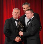 15 October 2010; Damien Hayes, Galway, is presented with his GAA Hurling All-Star award by Uachtarán Chumann Lúthchleas Gael Criostóir Ó Cuana and Jeroen Hoencamp, CEO, Vodafone Ireland, during the 2010 GAA All-Stars Awards, sponsored by Vodafone. Citywest Hotel & Conference Centre, Saggart, Co. Dublin. Picture credit: Oliver McVeigh / SPORTSFILE