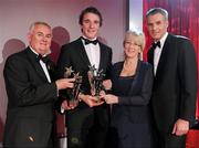 15 October 2010; Aidan Walsh, Cork, is presented with his GAA Football All-Star Young Player of the Year award by Uachtarán Chumann Lúthchleas Gael Criostóir Ó Cuana, Mary Hanafin TD, Minister for Tourism, Culture and Sport, and Jeroen Hoencamp, CEO, Vodafone Ireland, during the 2010 GAA All-Stars Awards, sponsored by Vodafone. Citywest Hotel & Conference Centre, Saggart, Co. Dublin. Picture credit: Brendan Moran / SPORTSFILE