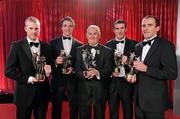 15 October 2010; Cork footballers, from left, Michael Shields, Aidan Walsh, Graham Canty and Paudie Kissane with Uachtarán Chumann Lúthchleas Gael Criostóir Ó Cuana during the 2010 GAA All-Stars Awards, sponsored by Vodafone. Citywest Hotel & Conference Centre, Saggart, Co. Dublin. Picture credit: Brendan Moran / SPORTSFILE