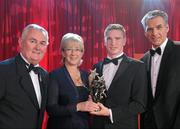15 October 2010; Brendan Maher, Tipperary, is presented with his GAA Hurling All-Star Young Player of the Year award by Uachtarán Chumann Lúthchleas Gael Criostóir Ó Cuana, Mary Hanafin TD, Minister for Tourism, Culture and Sport, and Jeroen Hoencamp, CEO, Vodafone Ireland, during the 2010 GAA All-Stars Awards, sponsored by Vodafone. Citywest Hotel & Conference Centre, Saggart, Co. Dublin. Picture credit: Ray McManus / SPORTSFILE