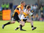 17 October 2010; David O'Leary, Dr. Crokes, in action against Kieran Donaghy, Austin Stacks. Kerry County Senior Football Championship Final, Austin Stacks v Dr. Crokes, Austin Stack Park, Tralee, Co. Kerry. Picture credit: Stephen McCarthy / SPORTSFILE