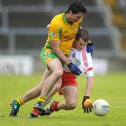 17 October 2010; Kieran Comer, Corofin, in action against Ian Reddington, Killererin. Galway County Senior Football Championship Final, Killererin v Corofin, Pearse Stadium, Galway. Picture credit: Ray Ryan / SPORTSFILE