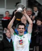 17 October 2010; Burren St Mary's captain Gerard McCartan lifts the cup. Down County Senior Football Championship Final, Burren St Mary's v Bryansford St Patrick's, Pairc Esler, Newry, Co. Down. Picture credit: Brian Lawless / SPORTSFILE