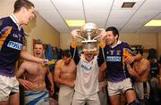 17 October 2010; Kilmacud Crokes players, from left to right, Rory O'Carroll, Nicky McGrath, Niall Corkery, David Nestor and Cian O'Sullivan, celebrate in the dressing room after the match. Dublin County Senior Football Championship Final, Kilmacud Crokes v St Brigid's, Parnell Park, Dublin Picture credit: Dáire Brennan / SPORTSFILE