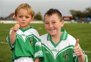 17 October 2010; Moorefield supporters Callum Duane, age 3, and Scott Kavanagh. age 10, both from Newbridge, Co. Kildare, before the game. Kildare County Senior Football Championship Final, Sarsfields v Moorefield, St Conleth's Park, Newbridge, Co. Kildare. Picture credit: Barry Cregg / SPORTSFILE