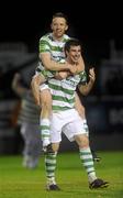 19 October 2010; Shamrock Rovers' Craig Sives carries team-mate Aidan Price in celebration after the match. FAI Ford Cup Semi-Final Replay, St Patrick's Athletic v Shamrock Rovers, Richmond Park, Inchicore, Dublin. Picture credit: Brian Lawless / SPORTSFILE