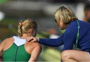 9 August 2016; Sanita Puspure of Ireland is consoled by coach Sarah-Jane McDonnell following her fourth place finish in the Women's Single Sculls quarter-final in Lagoa Stadium, Copacabana, during the 2016 Rio Summer Olympic Games in Rio de Janeiro, Brazil. Photo by Ramsey Cardy/Sportsfile