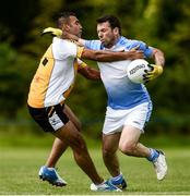 9 August 2016; Steve Cartledge of Argentina in action against Aindreas Doyle of Middle East during the Etihad Airways GAA World Games 2016 - Day 1 at UCD in Dublin. Photo by Sam Barnes/Sportsfile