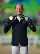 9 August 2016; Michael Jung of Germany after winning a gold medal in the Eventing Individual Jumping Final and a silver medal in the Eventing Team event at the Olympic Equestrian Centre, Deodoro, during the 2016 Rio Summer Olympic Games in Rio de Janeiro, Brazil. Photo by Stephen McCarthy/Sportsfile