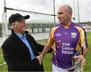 9 August 2016; Former Kilkenny player DJ Carey pictured with Paddy Timmons of the Sarsfield GAA Club at the fifth annual Hurling for Cancer Research, a celebrity hurling match in aid of the Irish Cancer Society in St Conleth’s Park, Newbridge.   Ireland's top GAA and horseracing stars lined out for the game, organised by horseracing trainer Jim Bolger and National Hunt jockey Davy Russell. To date the event has raised €400,000 for the Irish Cancer Society, the leading voluntary funder of cancer research in Ireland. St Conleth’s Park, Newbridge, Kildare. Photo by David Maher/Sportsfile