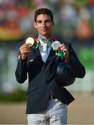 9 August 2016; Astier Nicolas of France after winning a silver medal in the Eventing Individual Jumping Final and a gold medal in the Eventing Team event at the Olympic Equestrian Centre, Deodoro, during the 2016 Rio Summer Olympic Games in Rio de Janeiro, Brazil. Photo by Stephen McCarthy/Sportsfile