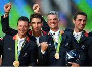 9 August 2016; Gold medalists, from left, Thibaut Vallette, Astier Nicolas, Karim Laghouag and Mathieu Lemoine of France following the Eventing Team Jumping Final at the Olympic Equestrian Centre, Deodoro, during the 2016 Rio Summer Olympic Games in Rio de Janeiro, Brazil. Photo by Stephen McCarthy/Sportsfile