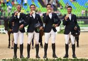 9 August 2016; Gold medalists, from left, Karim Laghouag, Mathieu Lemoine, Astier Nicolas and Thibaut Vallette  of France following the Eventing Team Jumping Final at the Olympic Equestrian Centre, Deodoro, during the 2016 Rio Summer Olympic Games in Rio de Janeiro, Brazil. Photo by Stephen McCarthy/Sportsfile