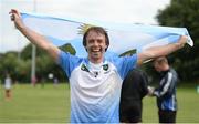 9 August 2016; Juan Patricio Wade of Argentina celebrates with his nation's flag following a victory over Chicago during the Etihad Airways GAA World Games 2016 - Day 1 at UCD in Dublin. Photo by Cody Glenn/Sportsfile
