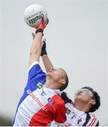 9 August 2016; Baptiste Lezin of France in action against Song Yang of Beijing during the Etihad Airways GAA World Games 2016 - Day 1 at UCD in Dublin. Photo by Cody Glenn/Sportsfile