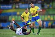 9 August 2016; Martin Schaefer of Brazil is tackled by Carlin Isles of USA during the Men's Pool A Rugby Sevens match between USA and Brazil at the Deodoro Stadium during the 2016 Rio Summer Olympic Games in Rio de Janeiro, Brazil. Photo by Stephen McCarthy/Sportsfile