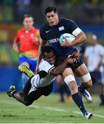 9 August 2016; Axel Muller of Argentina is tackled by Jerry Tuwai of Fiji during the Men's Pool A Rugby Sevens match between Fiji and Argentina at the Deodoro Stadium during the 2016 Rio Summer Olympic Games in Rio de Janeiro, Brazil. Photo by Stephen McCarthy/Sportsfile