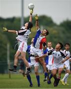 9 August 2016; Enze Wang of Beijing in action against Yoann Kersuzan of France during the Etihad Airways GAA World Games 2016 - Day 1 at UCD in Dublin. Photo by Cody Glenn/Sportsfile