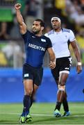 9 August 2016; Gaston Revol of Argentina celebrates a team-mates try during the Men's Pool A Rugby Sevens match between Fiji and Argentina at the Deodoro Stadium during the 2016 Rio Summer Olympic Games in Rio de Janeiro, Brazil. Photo by Stephen McCarthy/Sportsfile