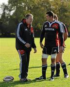 19 October 2010; Munster scrum coach Paul McCarthy in conversation with Alan Quinlan during squad training ahead of their Celtic League game against Benetton Treviso on Friday night. Munster Rugby squad training, University of Limerick, Limerick. Picture credit: Brendan Moran / SPORTSFILE