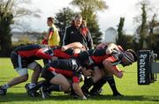 19 October 2010; Munster scrum coach Paul McCarthy watches the pack engage the scrum machine during squad training ahead of their Celtic League game against Benetton Treviso on Friday night. Munster Rugby squad training, University of Limerick, Limerick. Picture credit: Brendan Moran / SPORTSFILE
