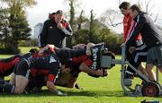 19 October 2010; Munster scrum coach Paul McCarthy watches the pack engage the scrum machine during squad training ahead of their Celtic League game against Benetton Treviso on Friday night. Munster Rugby squad training, University of Limerick, Limerick. Picture credit: Brendan Moran / SPORTSFILE