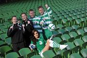21 October 2010; Club players, from left, Raheny United's Rebecca Creagh, from Walkinstown, and Rachell Graham, from Donaghmede, Whitehall Celtic's Barry Walsh, from Santry, and Gavin Jenkinson, from Whitehall, with model Nadia Forde as they launch a new club programme from Irish Football sponsors 3 which allows any footballl club playing in an FAI affiliated league to earn some extra money by signing up with 3. For every player/member/supporter who switches to 3 the club will receive a sign-on bonus. Then if they remain with 3 a loyalty payment will be paid to the club every quarter. For example, if a club manages to switch 200 people, they could earn more than €6000 next year. For more details on this and other 3 football news including priority ticketing for home internationals visit www.3football.ie/clubs. Aviva Stadium, Lansdowne Road, Dublin. Picture credit: Brian Lawless / SPORTSFILE