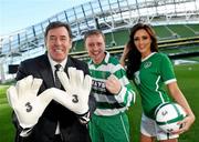 21 October 2010; Irish legend and FAI Technical Director Packie Bonner with model Nadia Forde and Whitehall Celtic's Gavin Jenkinson, from Whitehall, as they launch a new club programme from Irish Football sponsors 3 which allows any football club playing in an FAI affiliated league to earn some extra money by signing up with 3. For every player/member/supporter who switches to 3 the club will receive a sign-on bonus. Then if they remain with 3 a loyalty payment will be paid to the club every quarter. For example, if a club manages to switch 200 people, they could earn more than €6000 next year. For more details on this and other 3 football news including priority ticketing for home internationals visit www.3football.ie/clubs. Aviva Stadium, Lansdowne Road, Dublin. Picture credit: Brian Lawless / SPORTSFILE