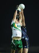 23 October 2010; Colm Begley, Ireland, and Kade Simpson, Australia, contest a high ball. Irish Daily Mail International Rules Series 1st Test, Ireland v Australia, Gaelic Grounds, Limerick. Picture credit: Ray McManus / SPORTSFILE