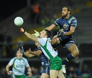 23 October 2010; Brendan Donaghy, Ireland, in action against Adam Goodes, Australia. Irish Daily Mail International Rules Series 1st Test, Ireland v Australia, Gaelic Grounds, Limerick. Picture credit: Alan Place / SPORTSFILE