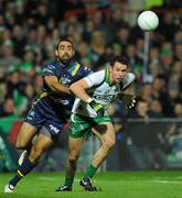 23 October 2010; Finian Hanley, Ireland, in action against Adam Goodes, Australia. Irish Daily Mail International Rules Series 1st Test, Ireland v Australia, Gaelic Grounds, Limerick. Picture credit: Alan Place / SPORTSFILE