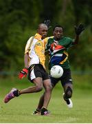 10 August 2016; Sami Gamal of Middle East in action against Phillip Ndabezinhle Maphakela of South Africa Gaels during the Etihad Airways GAA World Games 2016 - Day 2 at UCD in Dublin. Photo by Sam Barnes/Sportsfile