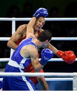 10 August 2016; Robenilson de Jesus, above, of Brazil in action against Fahem Hammachi of Algeria during their Men's Bantamweight Preliminary bout at the Riocentro Pavillion 6 Arena during the 2016 Rio Summer Olympic Games in Rio de Janeiro, Brazil. Photo by Stephen McCarthy/Sportsfile