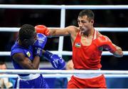10 August 2016; Dival Forele Malonga Dzalamou, left, of Congo in action against Fazliddin Gaibnazarov of Uzbekistan during their Men's Light Welterweight Preliminary bout at the Riocentro Pavillion 6 Arena during the 2016 Rio Summer Olympic Games in Rio de Janeiro, Brazil. Photo by Stephen McCarthy/Sportsfile