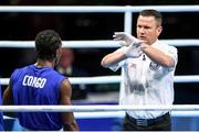 10 August 2016; The referee signals to Dival Forele Malonga Dzalamou of Congo that the fight is over, resulting in a TKO win for Fazliddin Gaibnazarov of Uzbekistan in their Men's Light Welterweight Preliminary bout at the Riocentro Pavillion 6 Arena during the 2016 Rio Summer Olympic Games in Rio de Janeiro, Brazil. Photo by Stephen McCarthy/Sportsfile