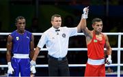 10 August 2016; Fazliddin Gaibnazarov of Uzbekistan is declared winner over Dival Forele Malonga Dzalamou of Congo via TKO in their Men's Light Welterweight Preliminary bout at the Riocentro Pavillion 6 Arena during the 2016 Rio Summer Olympic Games in Rio de Janeiro, Brazil. Photo by Stephen McCarthy/Sportsfile